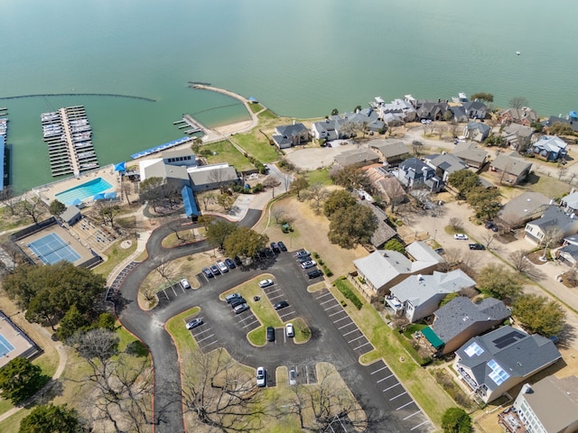 birds eye view of property with a residential view and a water view