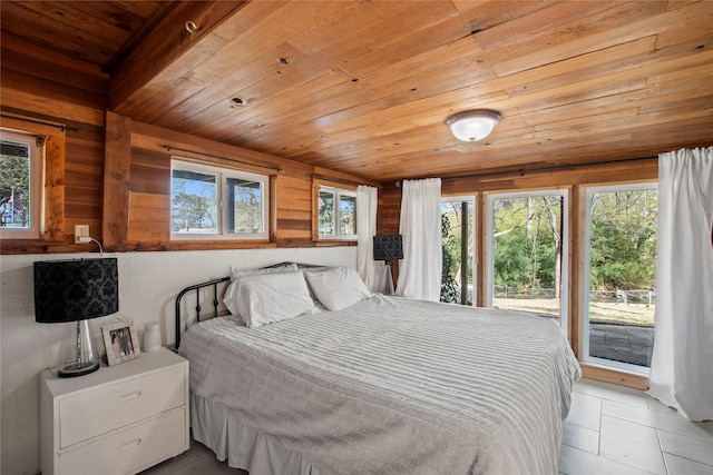 104 Henderson Harbor Cir, Payne Springs, TX 75156 - tiled bedroom featuring access to exterior, multiple windows, and wood ceiling