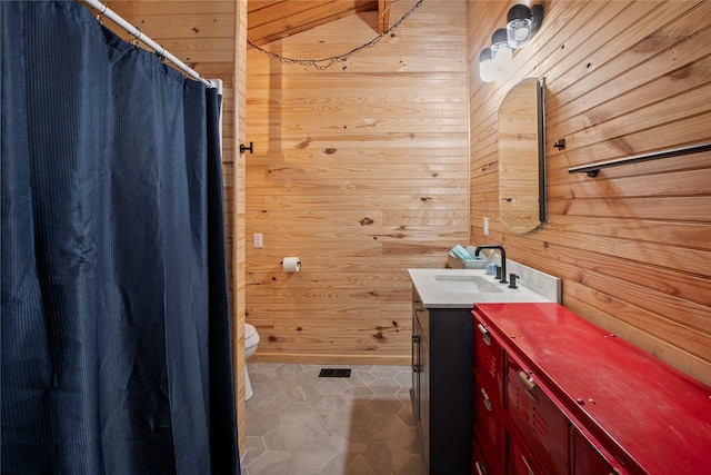 104 Henderson Harbor Cir, Payne Springs, TX 75156 - full bath with wood walls, vanity, toilet, and a shower with shower curtain