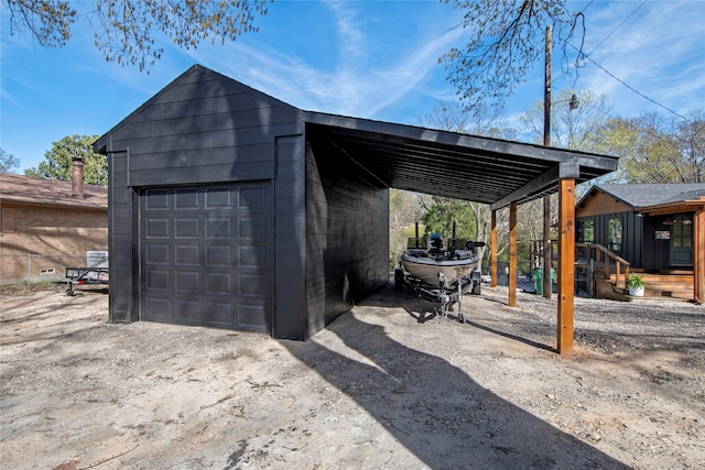 104 Henderson Harbor Cir, Payne Springs, TX 75156 - garage featuring driveway and a garage