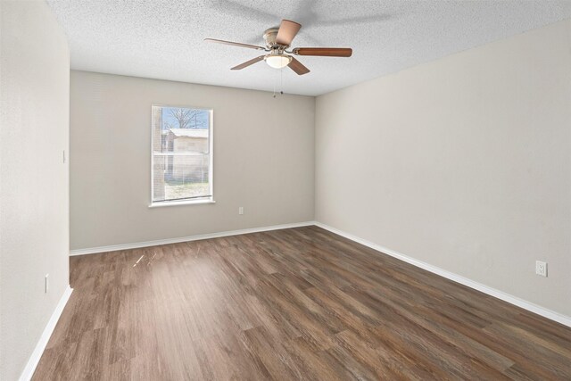 1505 W Collin, Corsicana, TX 75110 - unfurnished room with wood finished floors, ceiling fan, a textured ceiling, and baseboards