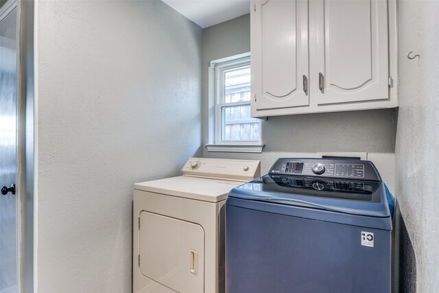 7211 La Sobrina Dr, Dallas, TX 75248 - washroom featuring cabinet space and separate washer and dryer