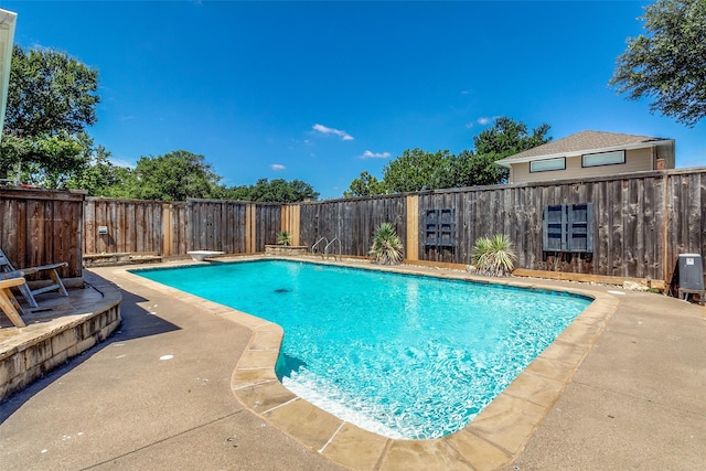 7211 La Sobrina Dr, Dallas, TX 75248 - view of swimming pool with a fenced backyard, a patio, and a diving board