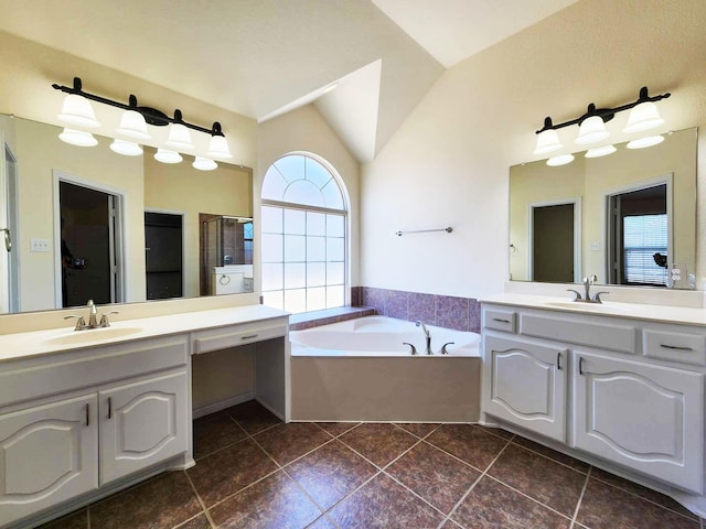 full bathroom featuring tile patterned flooring, a bath, a sink, and a stall shower