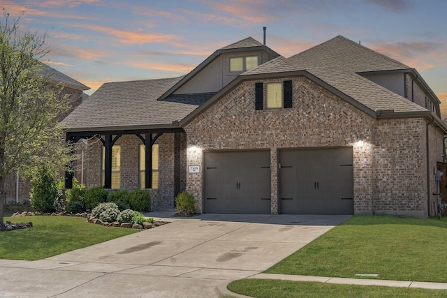 7909 Fossil Creek Trl, Mckinney, TX 75071 - view of front facade featuring brick siding, an attached garage, a lawn, and concrete driveway