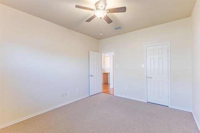 1032 Bending Oak Dr, Cedar Hill, TX 75104 - unfurnished bedroom with light carpet, baseboards, and a ceiling fan