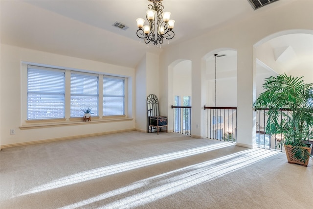 12252 Skipper Dr, Frisco, TX 75035 - carpeted empty room with a chandelier, baseboards, and lofted ceiling