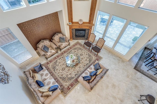 12252 Skipper Dr, Frisco, TX 75035 - living room featuring a towering ceiling and a high end fireplace