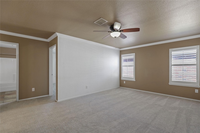 11279 Snyder Dr, Frisco, TX 75035 - spare room featuring ceiling fan, carpet flooring, ornamental molding, baseboards, and a textured ceiling