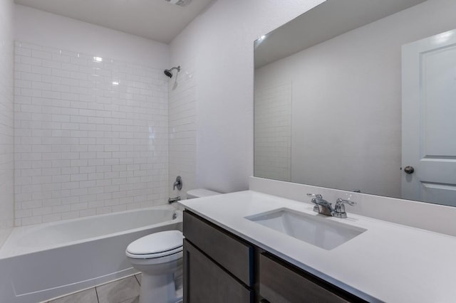 bathroom with tile patterned flooring, vanity, toilet, and shower / bathtub combination