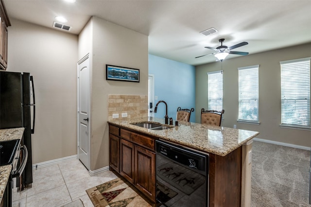 9848 Robinwoods Dr, Frisco, TX 75035 - kitchen featuring a sink, dishwasher, electric stove, ceiling fan, and a peninsula