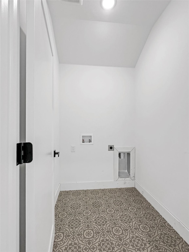 laundry area featuring laundry area, hookup for a washing machine, baseboards, and electric dryer hookup