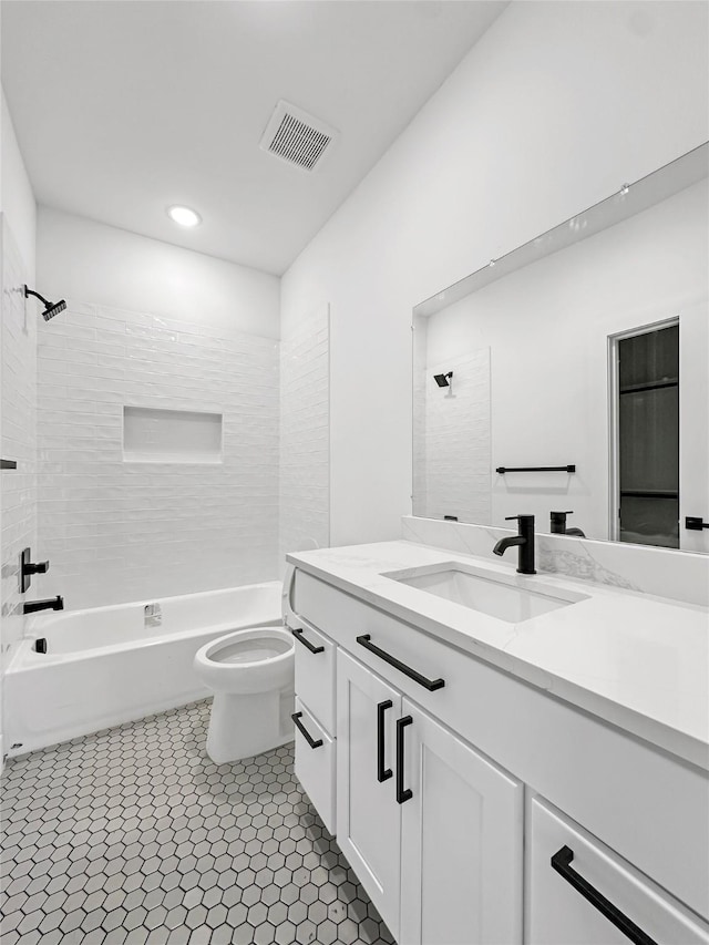 5401 Helmick Ave, Fort Worth, TX 76107 - bathroom with vanity, toilet, washtub / shower combination, and recessed lighting
