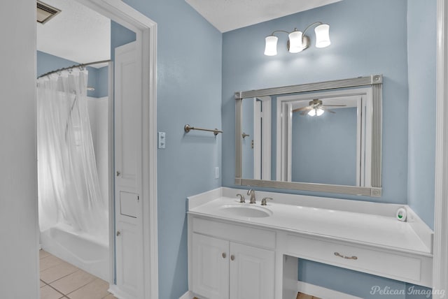 bathroom featuring shower / bathtub combination with curtain, vanity, a ceiling fan, tile patterned flooring, and visible vents