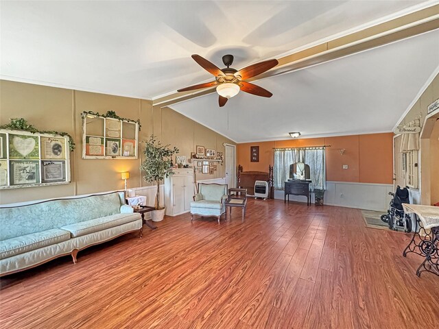 1791 County Road 3855, Poolville, TX 76487 - living area with a ceiling fan, wood finished floors, a wainscoted wall, and crown molding