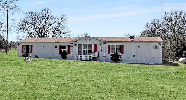 view of front facade with a front lawn