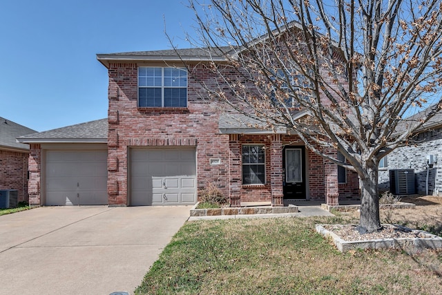 8529 Star Thistle Dr, Fort Worth, TX 76179 - traditional-style home with central air condition unit, driveway, a front yard, an attached garage, and brick siding
