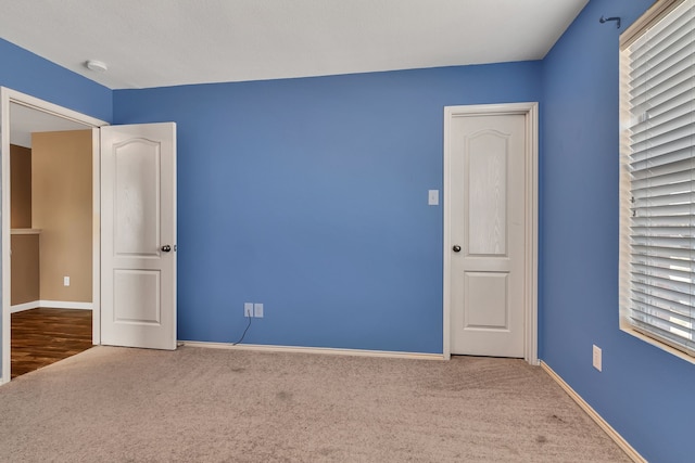 8529 Star Thistle Dr, Fort Worth, TX 76179 - unfurnished bedroom featuring baseboards and carpet floors