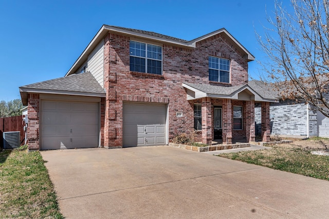8529 Star Thistle Dr, Fort Worth, TX 76179 - traditional-style house with brick siding, central AC unit, driveway, and roof with shingles