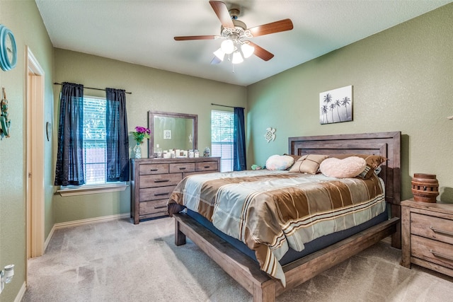 1017 Story Book Ln, Weatherford, TX 76086 - bedroom with ceiling fan, light carpet, and baseboards