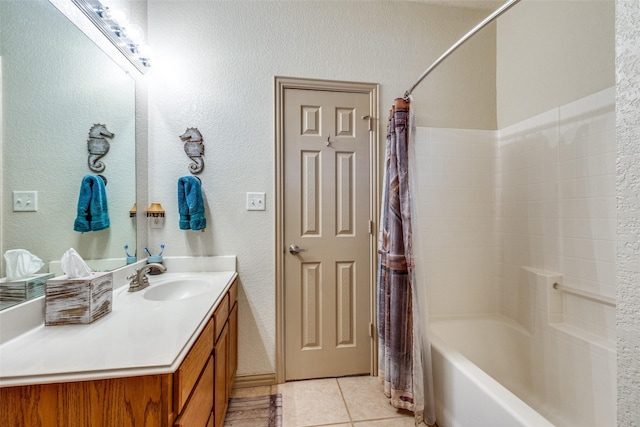 1017 Story Book Ln, Weatherford, TX 76086 - full bath featuring a textured wall, tile patterned floors, vanity, and shower / bath combination with curtain