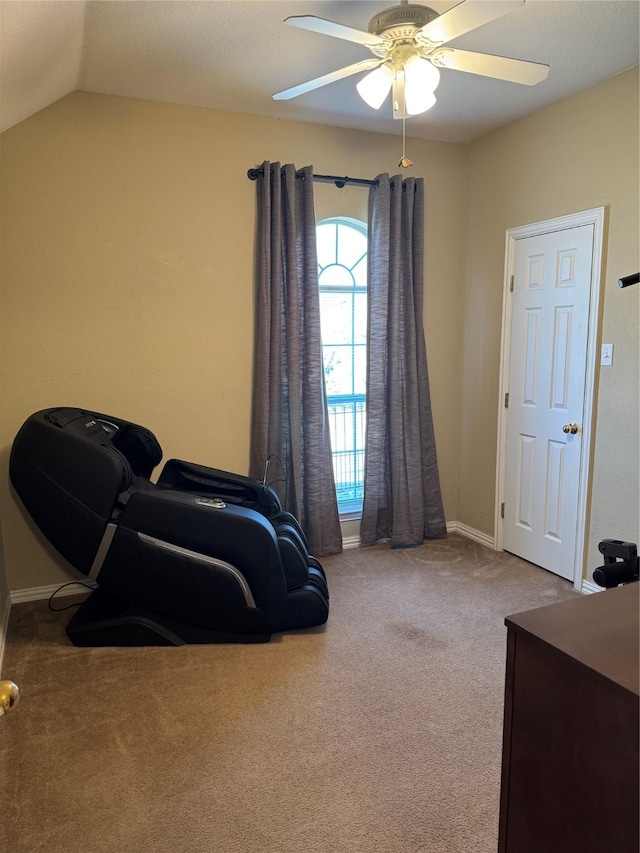 bedroom featuring ceiling fan, baseboards, lofted ceiling, and carpet floors