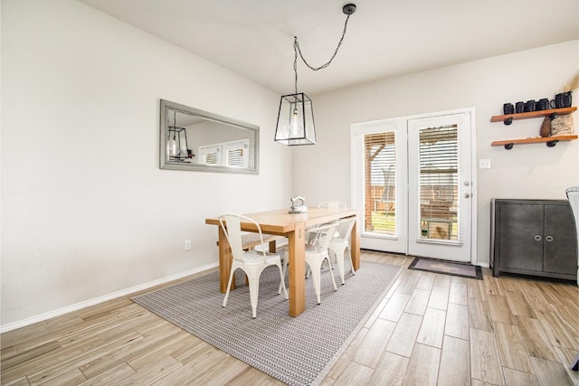 2015 Brenham Dr, Forney, TX 75126 - dining area with light wood-style floors and baseboards