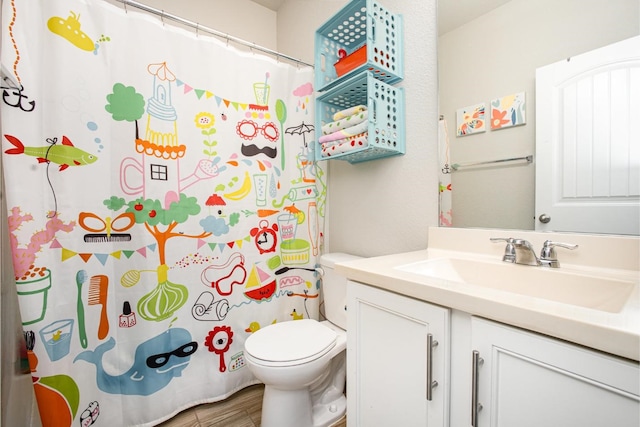 2015 Brenham Dr, Forney, TX 75126 - full bath featuring vanity, toilet, and a shower with curtain