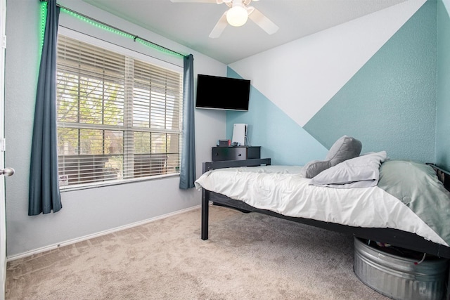 2015 Brenham Dr, Forney, TX 75126 - carpeted bedroom featuring multiple windows, lofted ceiling, a ceiling fan, and baseboards