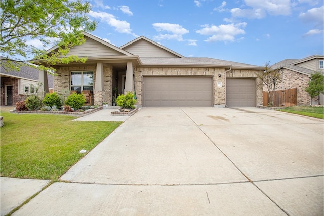 2015 Brenham Dr, Forney, TX 75126 - view of front facade with an attached garage, concrete driveway, and brick siding