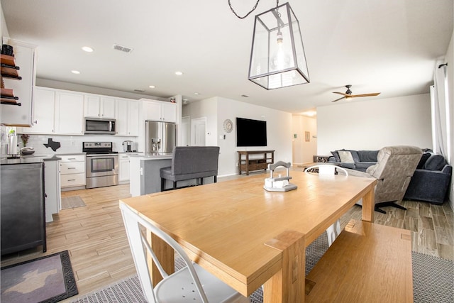2015 Brenham Dr, Forney, TX 75126 - dining area featuring light wood-type flooring, recessed lighting, and a ceiling fan