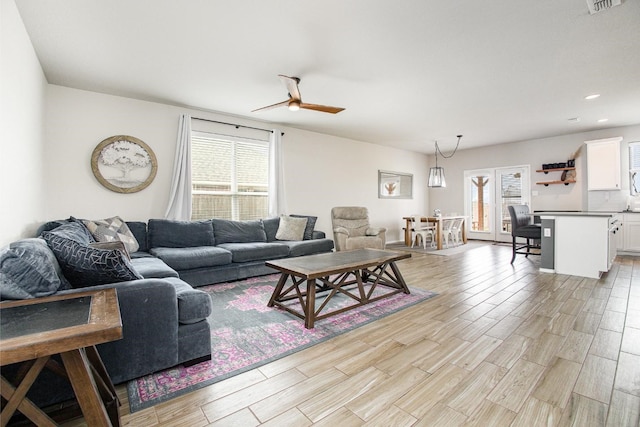 2015 Brenham Dr, Forney, TX 75126 - living room featuring light wood-type flooring, a ceiling fan, and recessed lighting