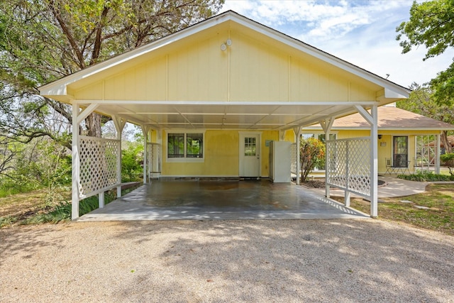 251 Dunn Dr, Palo Pinto, TX 76484 - view of front facade with a carport and driveway