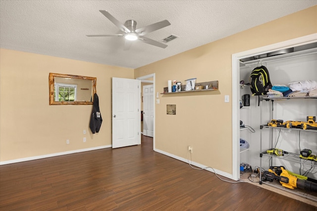 251 Dunn Dr, Palo Pinto, TX 76484 - spare room featuring a ceiling fan, wood finished floors, a textured ceiling, and baseboards