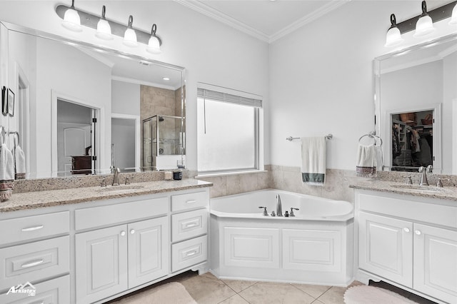 3032 Sagefield Ln, Haughton, LA 71037 - bathroom with a shower stall, crown molding, two vanities, a bath, and tile patterned floors