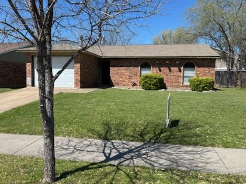 128 W Way Dr, Allen, TX 75002 - ranch-style house featuring brick siding, an attached garage, concrete driveway, and a front yard