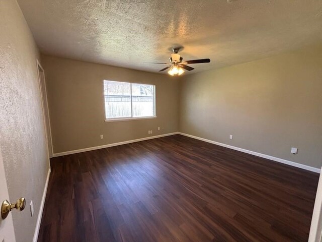 128 W Way Dr, Allen, TX 75002 - unfurnished room with dark wood-style floors, a textured ceiling, baseboards, and ceiling fan