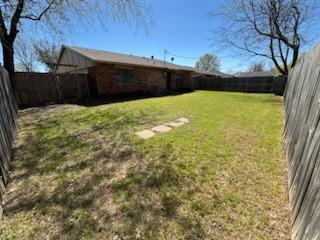 128 W Way Dr, Allen, TX 75002 - view of yard with a fenced backyard