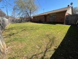 128 W Way Dr, Allen, TX 75002 - view of yard featuring a fenced backyard