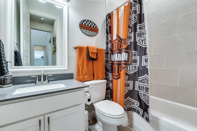 bathroom featuring vanity, toilet, and shower / tub combo