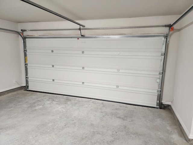 garage featuring baseboards