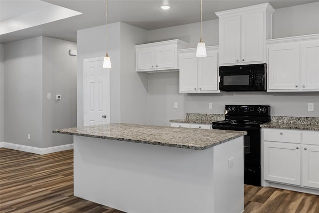 kitchen featuring white cabinetry, a center island, dark wood-style floors, and black appliances