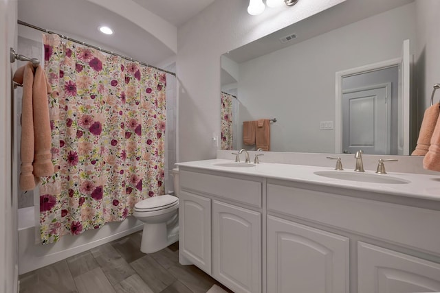 304 Welch Folly Ln, Aledo, TX 76008 - bathroom with toilet, double vanity, and shower / bath combo