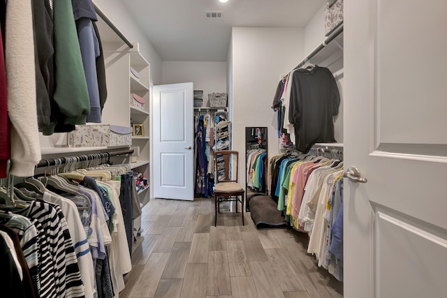 304 Welch Folly Ln, Aledo, TX 76008 - walk in closet with wood finished floors