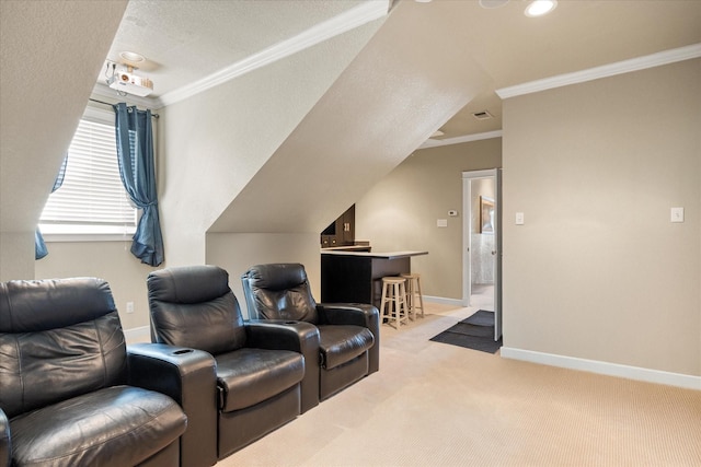 home theater room featuring light colored carpet, crown molding, visible vents, and baseboards