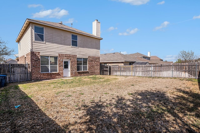 11904 Brown Fox Dr, Fort Worth, TX 76244 - rear view of house featuring a yard, a fenced backyard, and brick siding