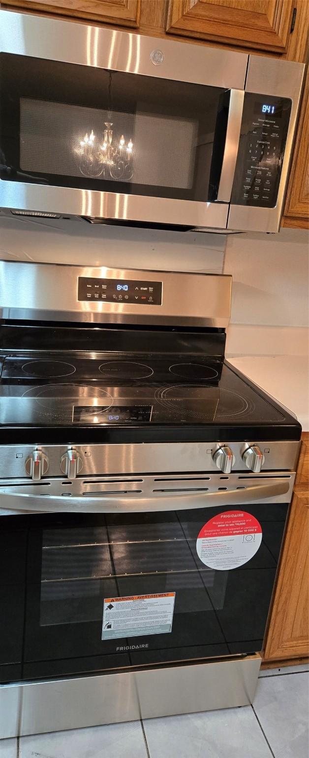 kitchen featuring brown cabinets and stainless steel appliances