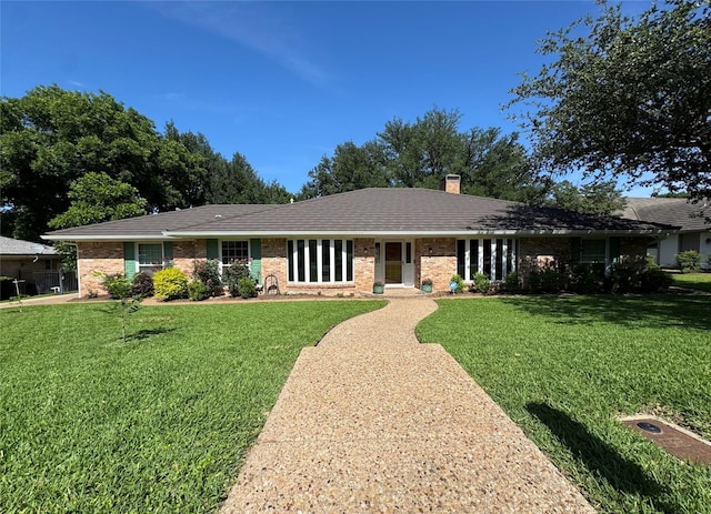 4379 Capra Way, Benbrook, TX 76126 - ranch-style house with a front lawn, a chimney, and brick siding