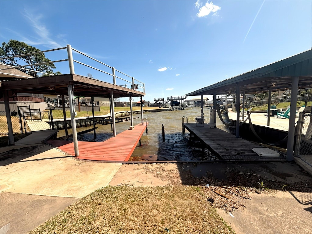 167 Seaside, Gun Barrel City, TX 75156 - dock area with fence, boat lift, and a water view