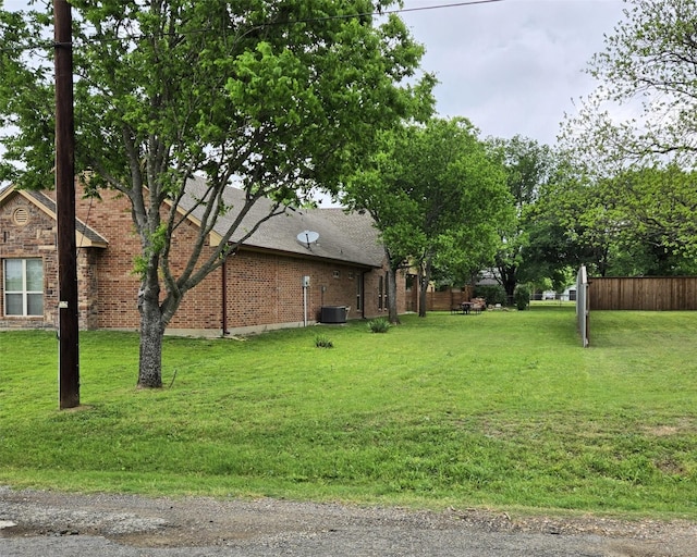 507 W 2nd St, Maypearl, TX 76064 - view of yard featuring central AC unit